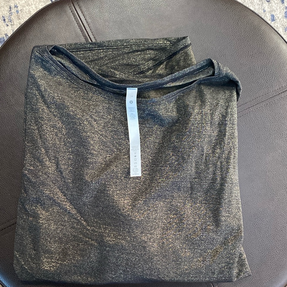 Lululemon Back in Action long sleeve; brand new w/o tags